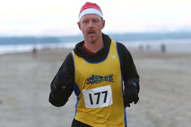 Anster Haddies' Tom Rainey finished third in their Santa's Sleigh of Fire 5k beach race at St Andrews on Sunday in 19:39