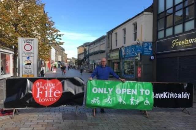 Kirkcaldy Central councillor Alistair Cameron with the new barriers in Kirkcaldy High Street.
