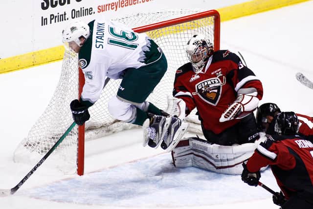 Goaltender Ryan Kubic of the Vancouver Giants makes a save against Carson Stadnyk of the Everett Silvertips during the third period of their WHL game at the Pacific Coliseum in  2015 in Vancouver, British Columbia, Canada. (Photo by Ben Nelms/Getty Images)