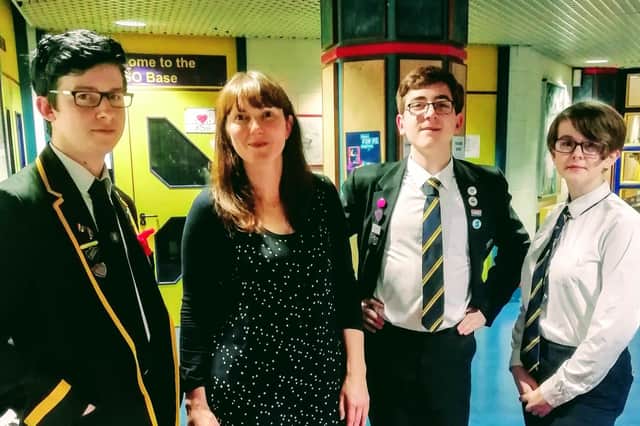Kirkcaldy High School has become only the second state school in Scotland to be awarded the LGBT "Gold" Charter by LGBT Youth Scotland. Pictured are:  John Hamilton, Blake McBride and Morgan Cameron of the steering group with Cara Spence in school at the end of last year.