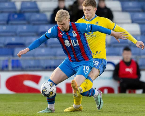 Inverness Caledonian Thistle's Luis Longstaff shielding the ball from Raith' Rovers striker Jack Hamilton on Friday (Photo by Mark Scates/SNS Group)