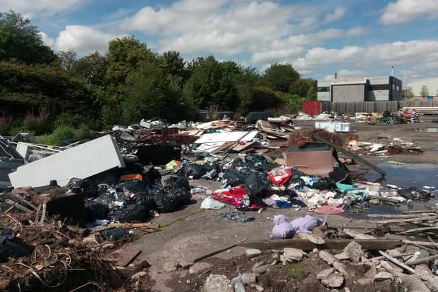 The dumped rubbish is strewn across the large site of the former factory