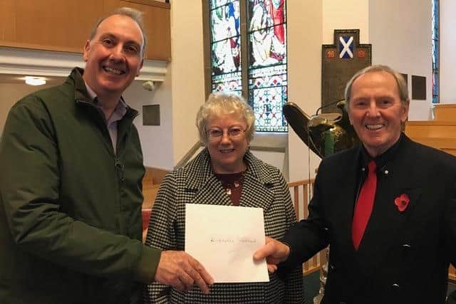 Ian Campbell (Kirkcaldy Foodbank chair), Morag Michael (Abbotshall Church session slerk ) and Euan Fraser (Abbotshall Church treasurer) at Sunday's service