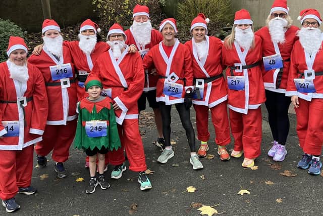 Kirkcaldy Wizards taking part in a 5k Santa dash held by Dunfermline Rotary Club at Pittencrieff Park