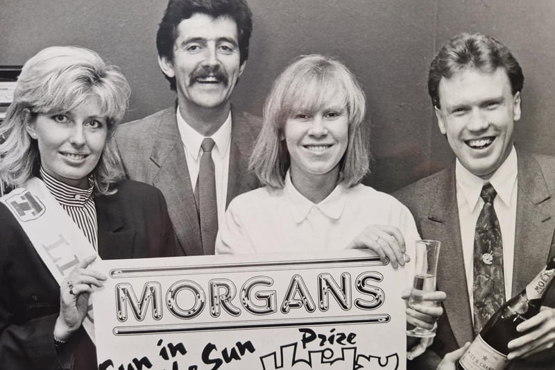 “Winner” is all the caption tells us, but we do know the picture was taken at Morgan’s in Glenrothes in 1988, and going by the poster, the prize was a holiday in the sun!