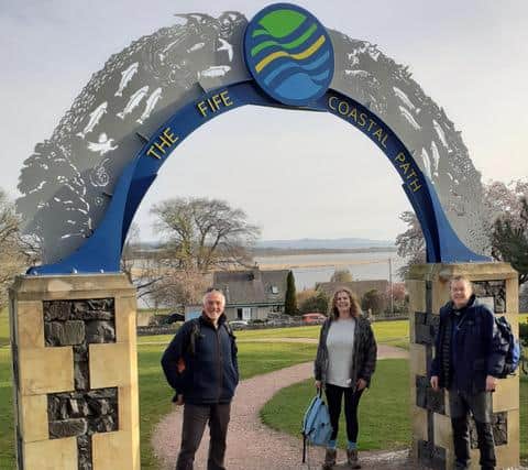 Three members of the Rotary Club of Kirkcaldy  - Bill Stewart, Caroline King and Mark Rossiter walked the Fife Coastal Path to raise funds for their club. Pic: George McLuskie