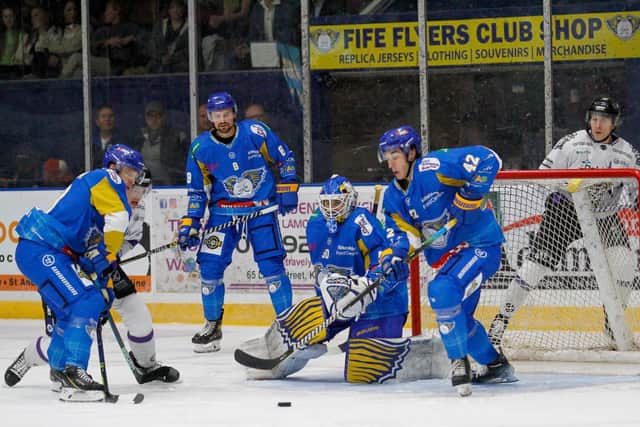Shane Owen and Reece Harsch in the thick of the action against Manchester Storm (Pic: Jillian McFarlane)