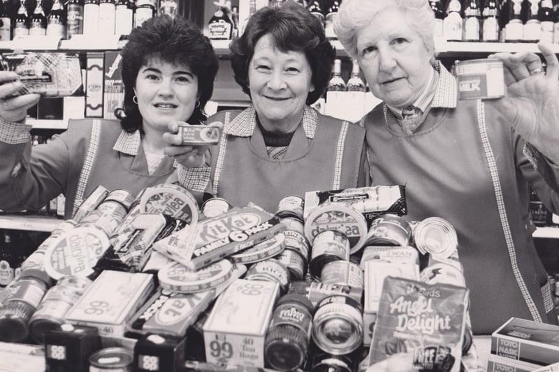 The draw for a Christmas hamper packed with goodies -including Angel Delight, KitKats, Dairylea, and  teabags! It was made at the Glenrothes Co-Op and the picture features  Jacqueline Dick, Ann Page and Elizabeth Jack.