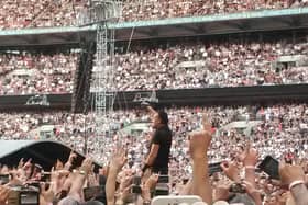 Bruce Springsteen surrounded by 80,000 fans at Wembley Stadium (Pic: Allan Crow)