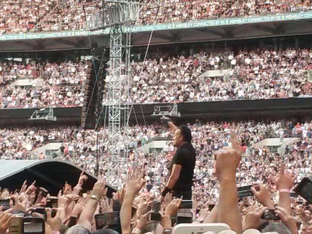 Bruce Springsteen surrounded by 80,000 fans at Wembley Stadium (Pic: Allan Crow)