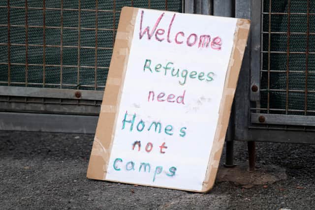 A sign at the entrance to Penally Training Camp on March 20, 2021 in Penally, Wales. Penally Army Training camp, a military base just outside Tenby in Pembrokeshire, was used to house up to 250 asylum seekers from September last year. p (Photo by Matthew Horwood/Getty Images)