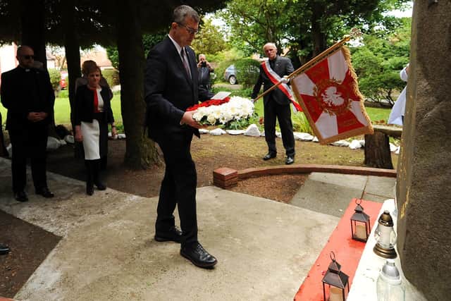 Polish Ambassador Piotra Wilczka lays wreath at the Katyn memorial at Kirkcaldy's Polish Club (Pic: Fife Photo Agency)