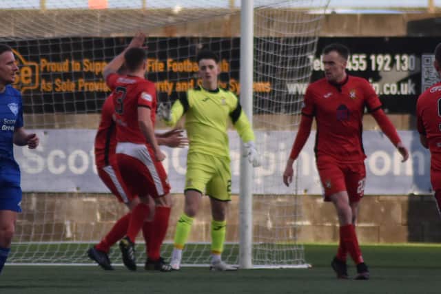 Liam Campbell takes the plaudits following his penalty save. Pic by Kenny Mackay