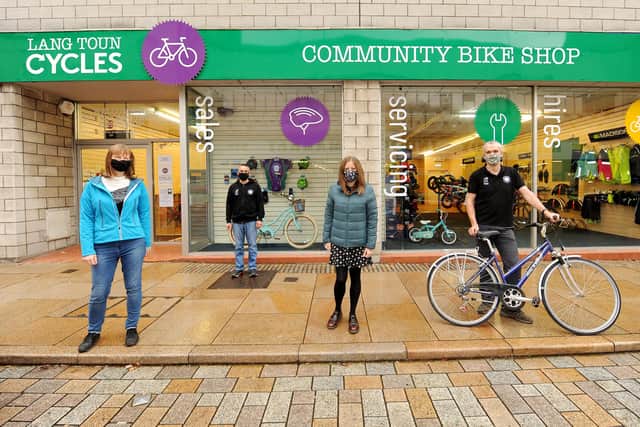 The new community bike shop - Lang Toun Cycles - opens on Tuesday. Pictured from Greener Kirkcaldy are: Suzy Goodsir, chief executive, Stewart Murray, Lang Toun Cycles and Lauren Parry with  David Glover. Pic: Fife Photo Agency