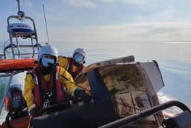 Kinghorn lifeboat crew return with the yacht tender recovered from the Forth (Pic: Kinghorn RNLI)