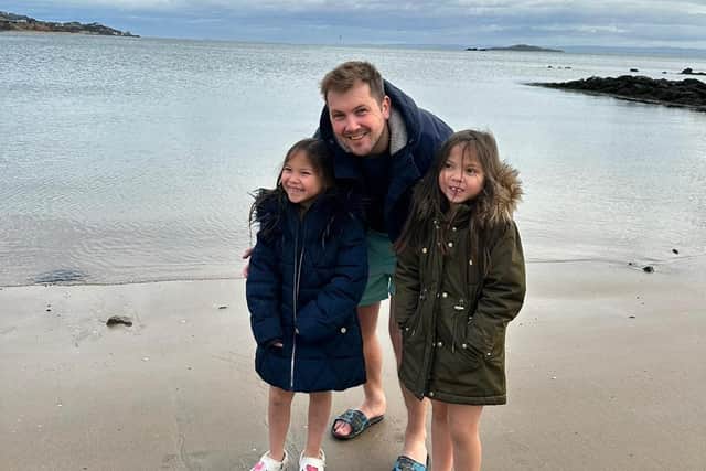 Annabella and Isabella Roy with dad Michael (Pic: Submitted)