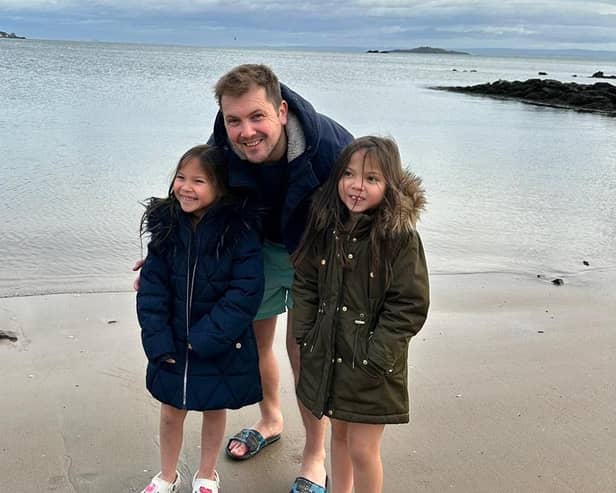 Annabella and Isabella Roy with dad Michael (Pic: Submitted)