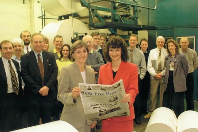 Karen McCallum (nee Livingston), PA to the MD,  and her sister Jill with the last edition of the Fife Free Press to be printed at Mitchelston in Kirkcaldy