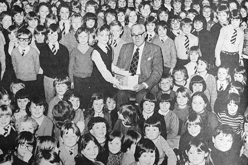 After serving as Sinclairtown Priomary School's janitor for an incredible 28 years, William Walker of Kirkcaldy retired in 1978.
William was presented with gifts on behalf of the pupils by Kirsten Robertson. 