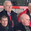John Sim (wearing red jacket) is pictured watching his beloved Raith Rovers (Photo by Paul Devlin/SNS Group)