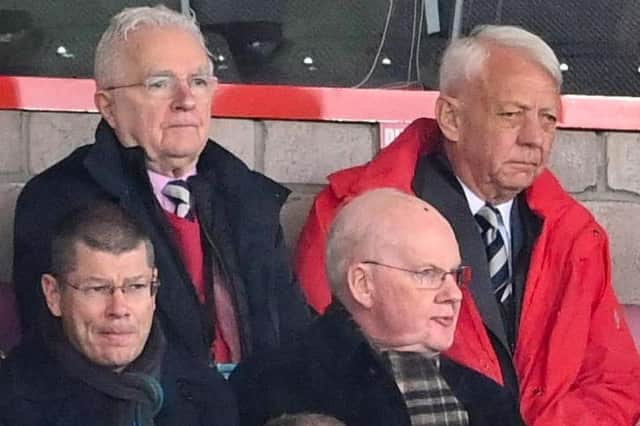 John Sim (wearing red jacket) is pictured watching his beloved Raith Rovers (Photo by Paul Devlin/SNS Group)