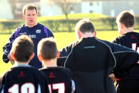 Chris Fusaro passes on some rugby hints and tips to Fife school pupils. Pic by Walter Neilson
