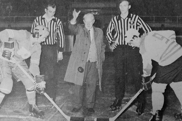 Fife Flyers 1973: John Calderwood, aged 82 - the oldest director of Kirkcaldy Ice Rink - drops the puck at the opening game of the 1973-74 ice hockey season.