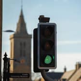 Traffic lights with St Salvator's Chapel-Tower in the background