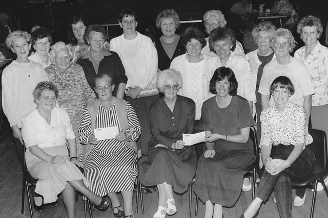 Cheques were handed out at Mountfleurie Women's Guild in September 1993. Pictured, from left, are Janet Fullerton, Rea Stevens, Irene Anderson (president), Susan Mair (St Paul's) and Margaret O'Neil.