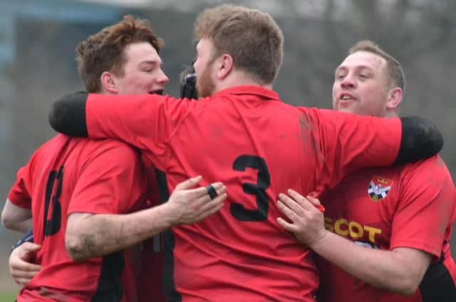Glenrothes man of the match Stevie Dean (right) getting a celebratory hug from team-mates after semi-final win over Alloa