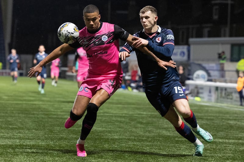 KIRKCALDY, SCOTLAND - DECEMBER 22: Ayr's Frankie Musonda (L) and Raith's Jack Hamilton in action during a cinch Championship match between Raith Rovers and Ayr United at Stark's Park, on December 22, 2023, in Kirkcaldy, Scotland. (Photo by Mark Scates / SNS Group)