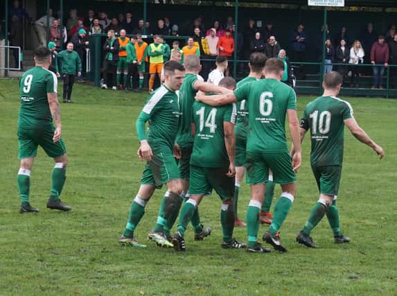 Andy Adam is congratulated for his part in the third Thornton goal (Pic by John Laing)