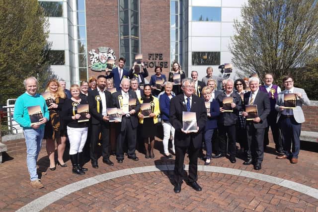 David Alexander leads the SNP candidates at the manifesto launch outside Fife House