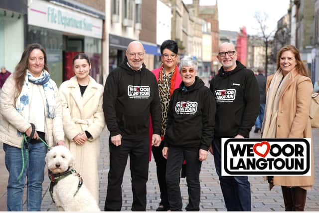 The Love Oor Lang Toun team in the High Street with local businesswoman Amanda Allan (Pic: Cath Ruane)
