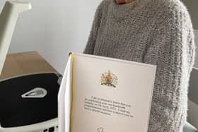 Cath was able to hear what the Queen had written in her 100th birthday card, thanks to an OCR Hark audio reader.