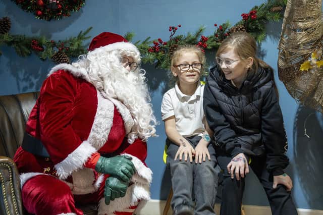 Santa finds out what these youngsters want for Christmas after dropping into Cupcake Coffee in Kirkcaldy