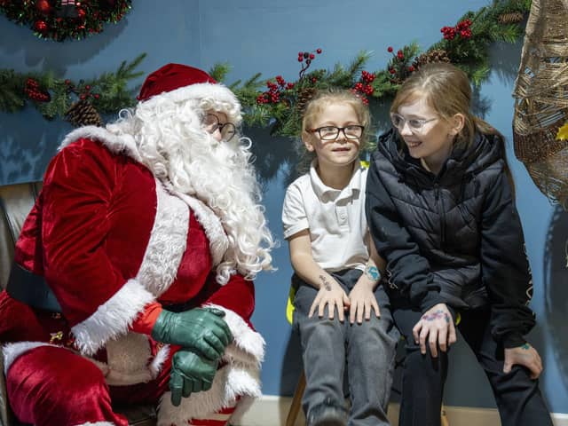 Santa finds out what these youngsters want for Christmas after dropping into Cupcake Coffee in Kirkcaldy