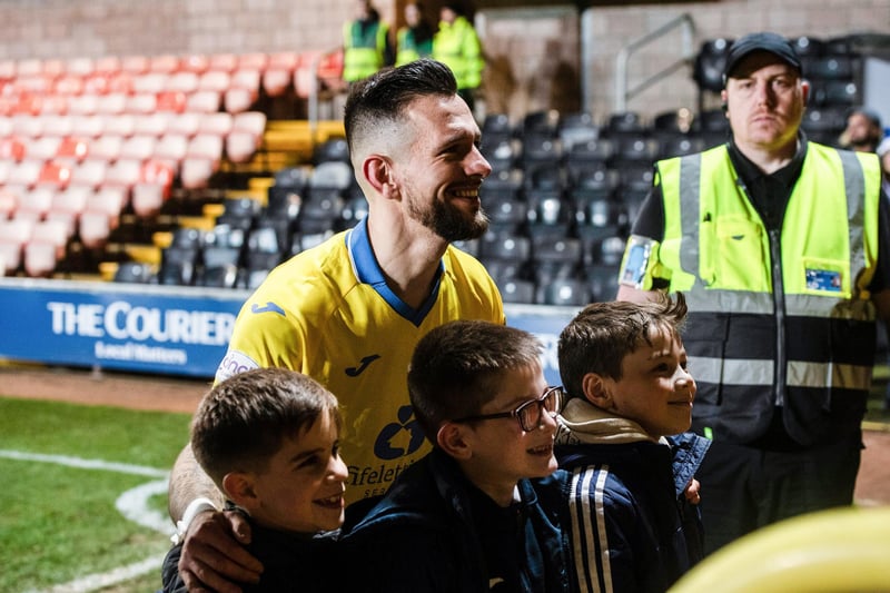 Dylan Easton celebrates with young Raith Rovers fans who made the trip to Dundee for the top-of-the-table clash