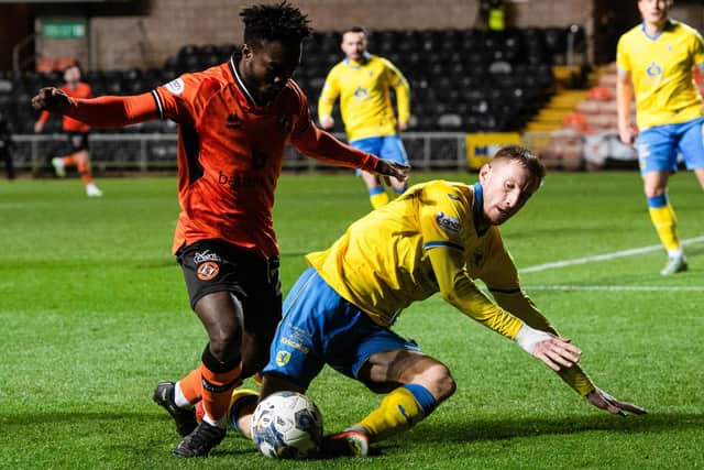Dundee United's Mathew Cudjoe and Raith Rovers' Liam Dick vying for the ball at Tannadice Park on Saturday (Photo by Sammy Turner/SNS Group)