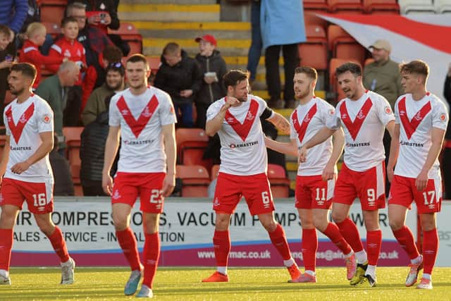 Callum Smith (third right) and his Airdrieonians mates came through the Championship play-offs last season (Pic Michael Gillen)