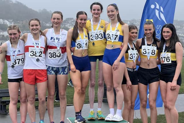 Fife AC athletes (in white, from left) Eliza Konig, Katie Sandilands and Nellie Luxford won team silver at Under-17 5k Women's Race at National Young Athlete Road Race Championships in Greenock