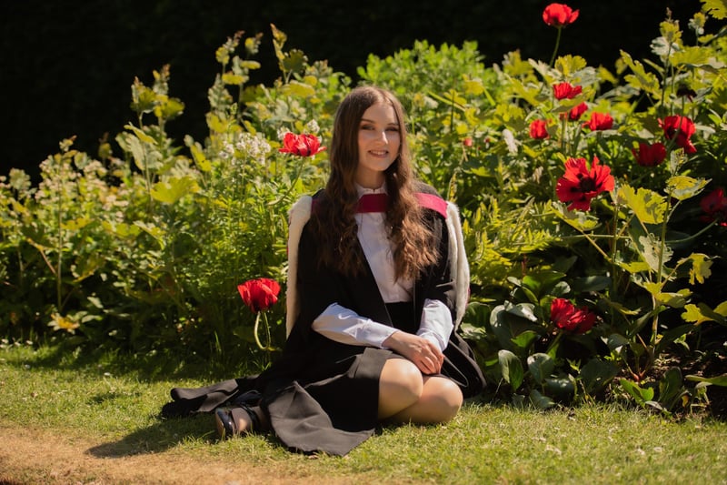 Kirsty MacDonald, who has attended five universities during a "12-year rollercoaster" of health issues celebrated her graduation with First-Class Honours in Neuroscience in the St Andrews Botanic Gardens