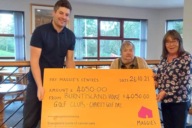 Adam Kent receives the £4000 cheque from Burntisland Golf House Club's event