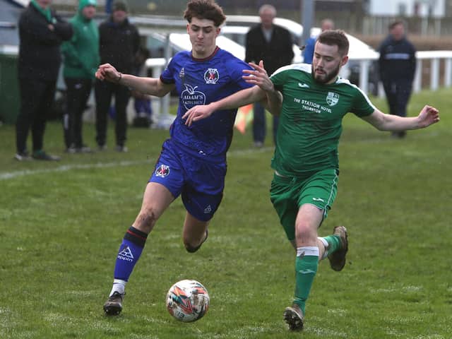 Hawick Royal Albert's Harry Fowler and Thornton Hibs' Matthew Robertson vying for the ball on Saturday (Photo: Steve Cox)