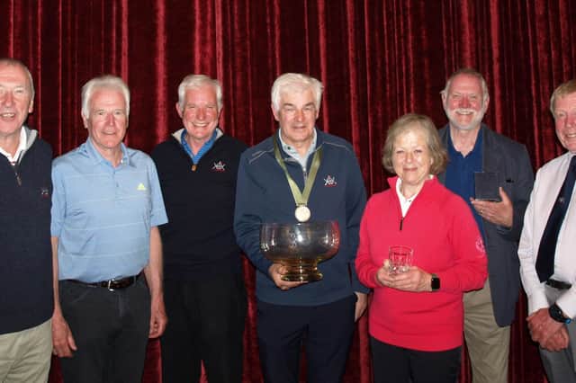 Members of the winning XIXth Hole GC team and the individual winners, Jimmy Lindsay, Bob Edie, Dave Finlay, Ian Mason, Ros Rentoul, Dennis Clark and Jim Bennett.