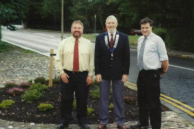 Kirkcaldy Probus Club millenium tree planting, from left to right, Brian Shand, Harry Gray, and Roy Daniels.