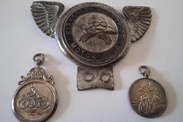Dr John Lawson Swanston's 1930's car badge, and two medals from the 1929 Elie Grasstrack won by JK Swanston.