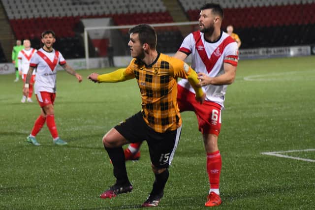 East Fife's Jamie Semple comes under pressure from Callum Fordyce during the weekend's defeat. Pic by Kenny Mackay