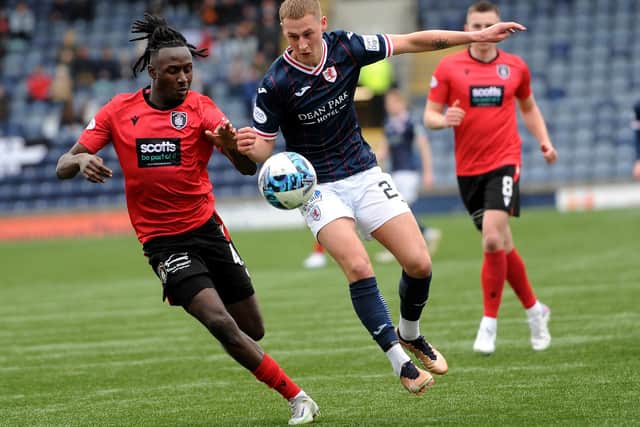 Raith Rovers' Scott McGill and Queen's Park's Malachi Boateng vying for the ball on Saturday (Pic: Fife Photo Agency)
