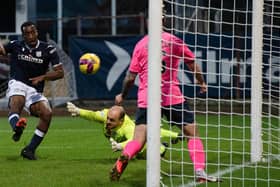 DUNDEE, SCOTLAND - NOVEMBER 12: Zach Robinson scores to make it 2-0 uring a cinch Championship match between Dundee and Raith Rovers at Dens Park, on November 12, 2022, in Dundee, Scotland. (Photo by Sammy Turner / SNS Group)